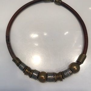 Vintage leather and brass necklace truly from the seventy’s